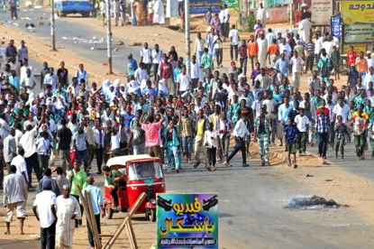 Sudanese protestors demonstrate in Khartoum's twin city of Omdurman after the government announced steep price rises for petroleum products after suspending state subsidies as part of crucial economic reforms on September 25, 2013 (c) STR/AFP/Getty Images