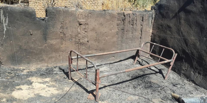 Burned home in Mouli village