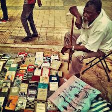 Man at the Mafroosh used book market. Photo: Khalid Albaih.