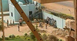 Detainees facing the wall inside NISS office.