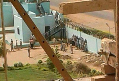 Detainees facing the wall inside NISS office.