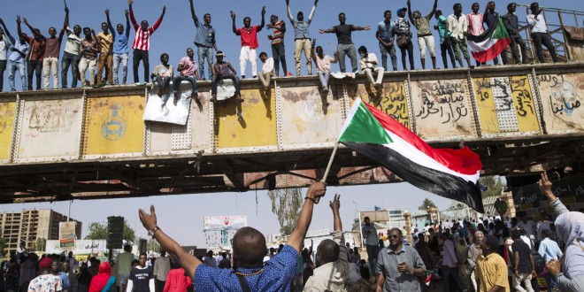 Photo credit: David Rose/Panos Pictures. Protesters crowded a bridge in the city centre of Khartoum, Sudan, as the continuing citizen protests entered its fourth week since the fall of President Omar al-Bashir. The protesters were demanding that a new interim civilian ruling council be formed to enable the country to move towards a more democratic form of rule.