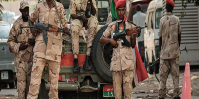 Rapid Support Forces patrolling the streets of Khartoum in June 2019 (Photo by AFP)